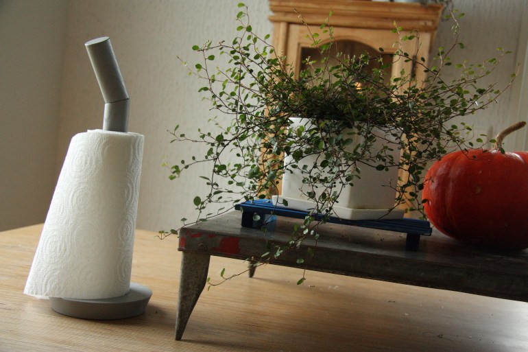 hay papertowel holder and flower stand