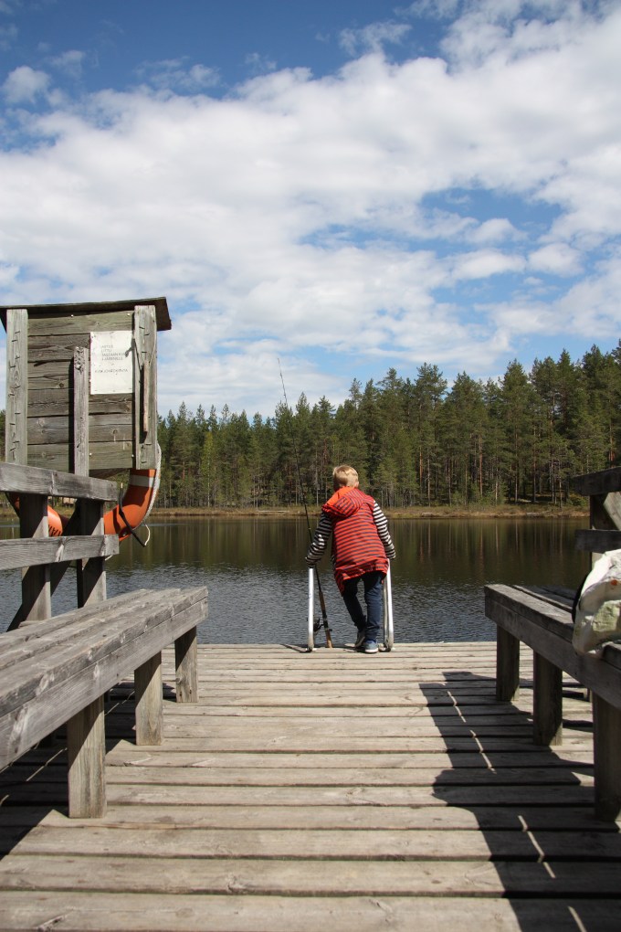 boy and his fishing rod